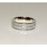 14ct white gold half eternity ring with two rows of diamonds. total weight approx 1.1ct. Size Y