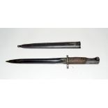 A WW2 knife bayonet in its steel scabbard. Blade length 24.5cms