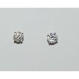 Pair of 14ct white gold diamond stud earrings of 1.5ct