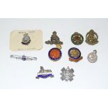 Ten assorted sweetheart brooches and lapel badges including silver