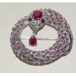 Impressive silver and ruby snake brooch