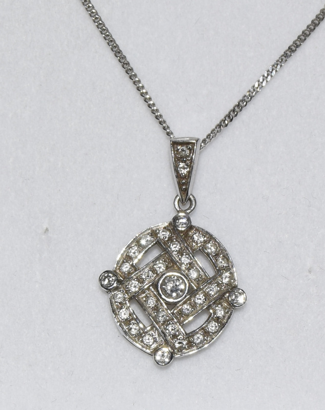 18ct white gold Diamond pendant necklace on 9ct white gold chain hallmarked 0.6ct dia