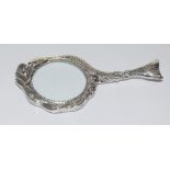 A silver hand held magnifying glass