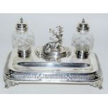 Silver plated desk nkstand with inkwells and hind figure