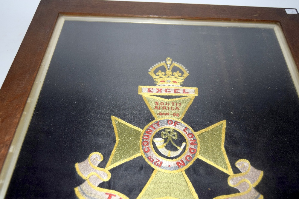 A framed and glazed woolwork embroidery of the badge of the 12th County of London Regiment The - Image 3 of 6