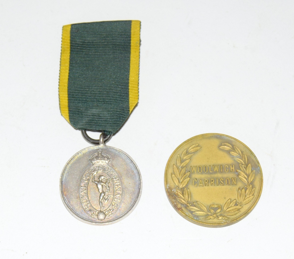 A 1925 Woolwich Garrison boxing medallion and a 1928 Royal Corps of Signals 66 Drills silver medal