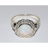 Silver CZ and opal ring