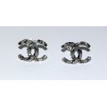 A pair of silver designer style earrings