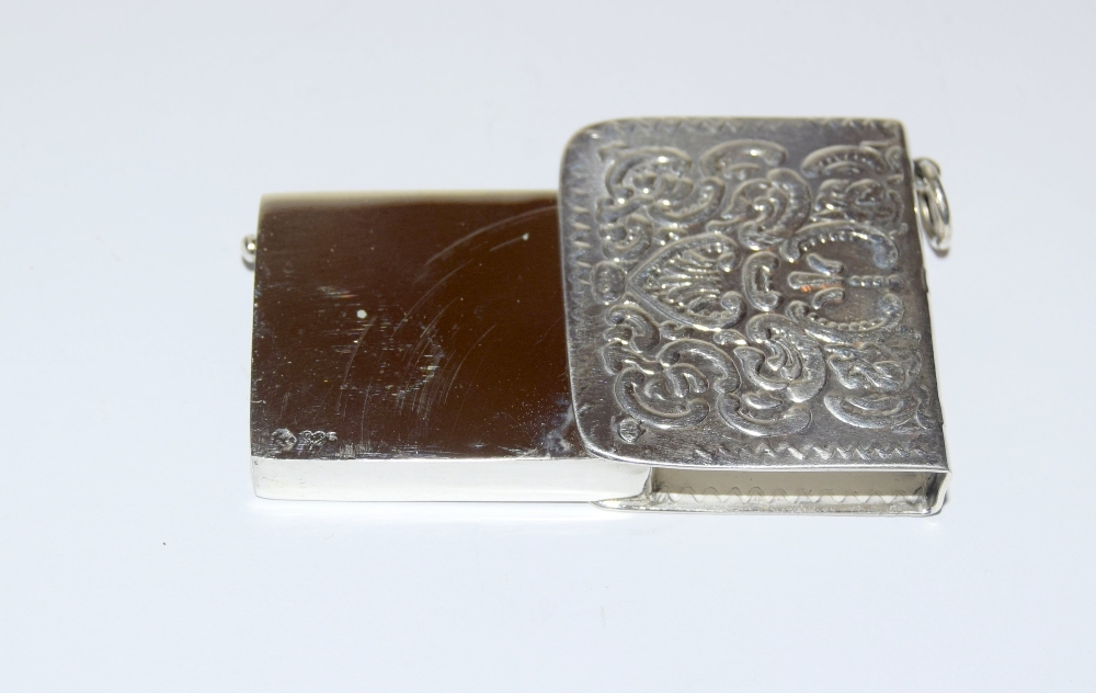 A silver stamp case with embossed decoration - Image 5 of 6