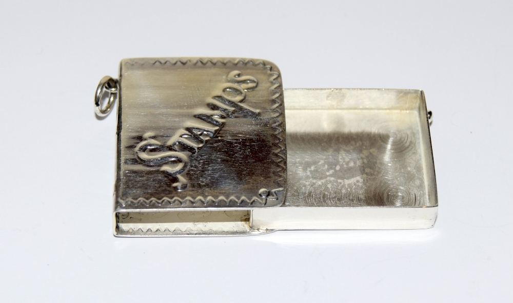 A silver stamp case with embossed decoration - Image 3 of 6