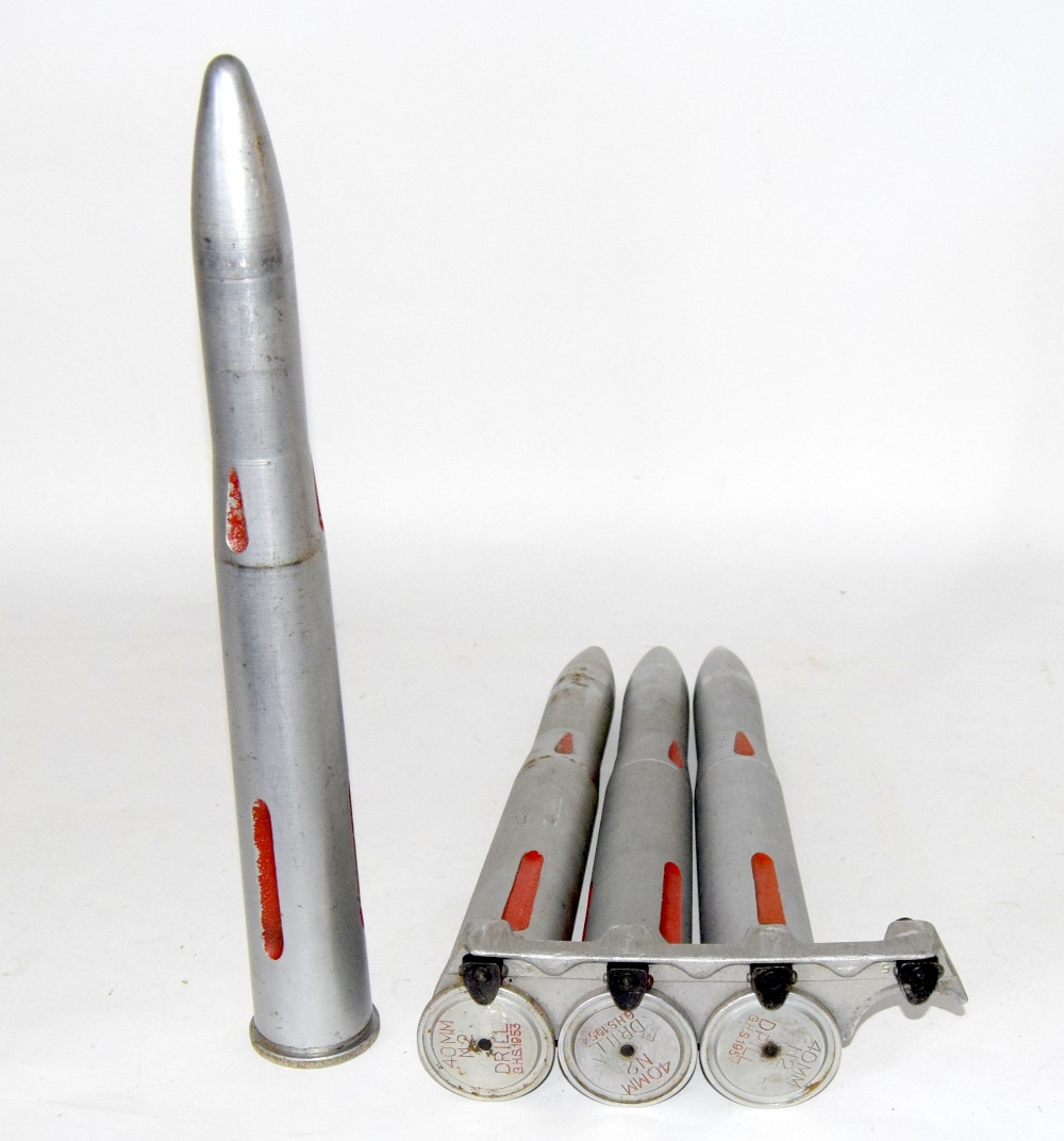 A clip of four British Naval 40mm N2 BOFORS drill rounds 45cms in length - Image 7 of 8