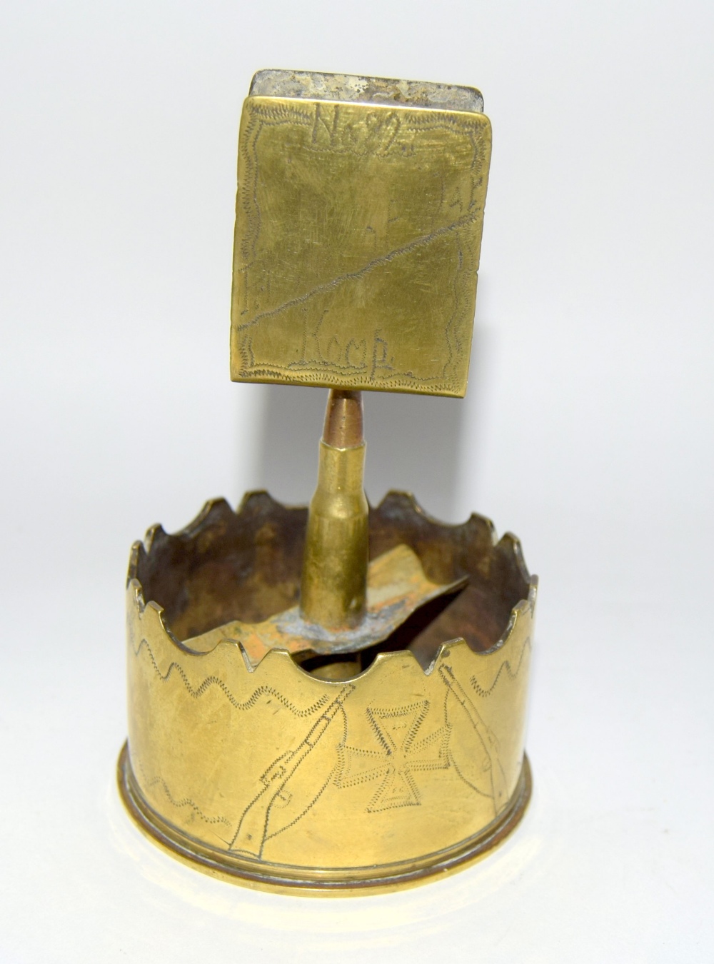 A WW1 trench art ashtray and matchbox holder - decorated with a German Iron Cross and No.82 Prisoner