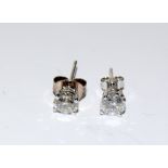 Pair of white gold diamond stud earrings of 1.1ct