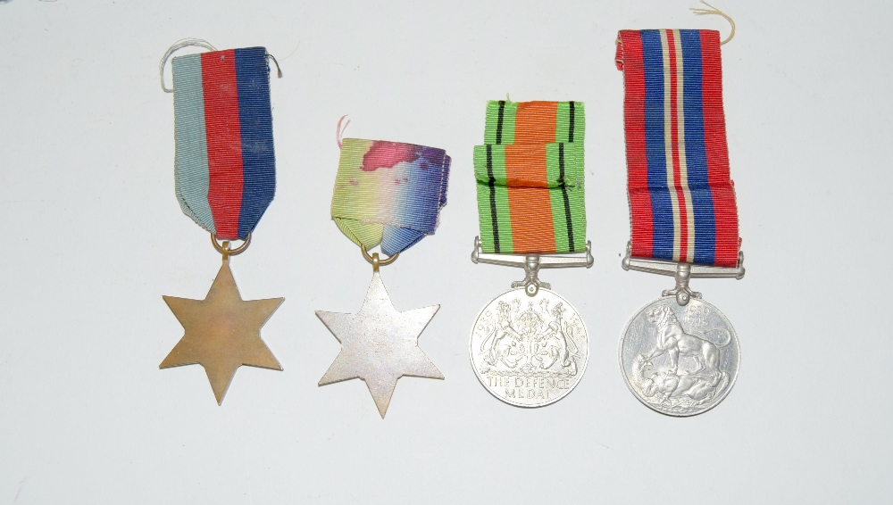 A WW2 Royal Navy medal group of four including the Atlantic Star with a souvenir embroidery of Egypt - Image 9 of 10