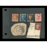 A Great Britain 1840 1d black stamp (cut into), an 1841 2d blue and four other stamps.Buyer’s