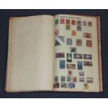 Three stamp albums of world stamps, including British Commonwealth with George VI short sets, and