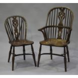A set of six 20th century ash and elm Windsor dining chairs, comprising two carver and four