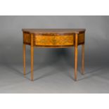 A late Victorian Neoclassical Revival satinwood bowfront side table, profusely inlaid with flowering