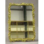 A 20th century gilt composition wall mirror with moulded foliate decoration, 30cm x 92cm.Buyer’s