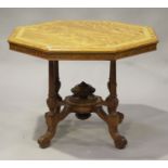 A late Victorian satinwood octagonal centre table with crossbanded and ebony line inlaid decoration,