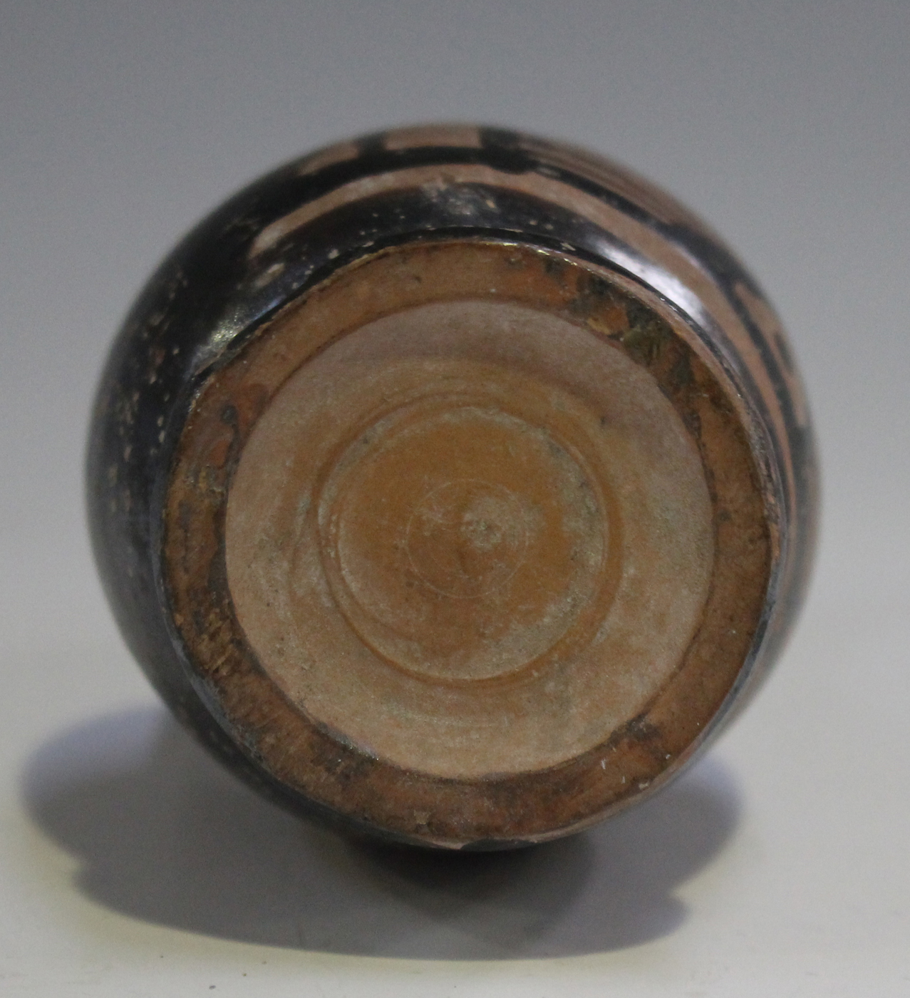 An Ancient Greek Apulian Xenon ware terracotta miniature ewer, circa 4th century BC, the black - Image 2 of 3