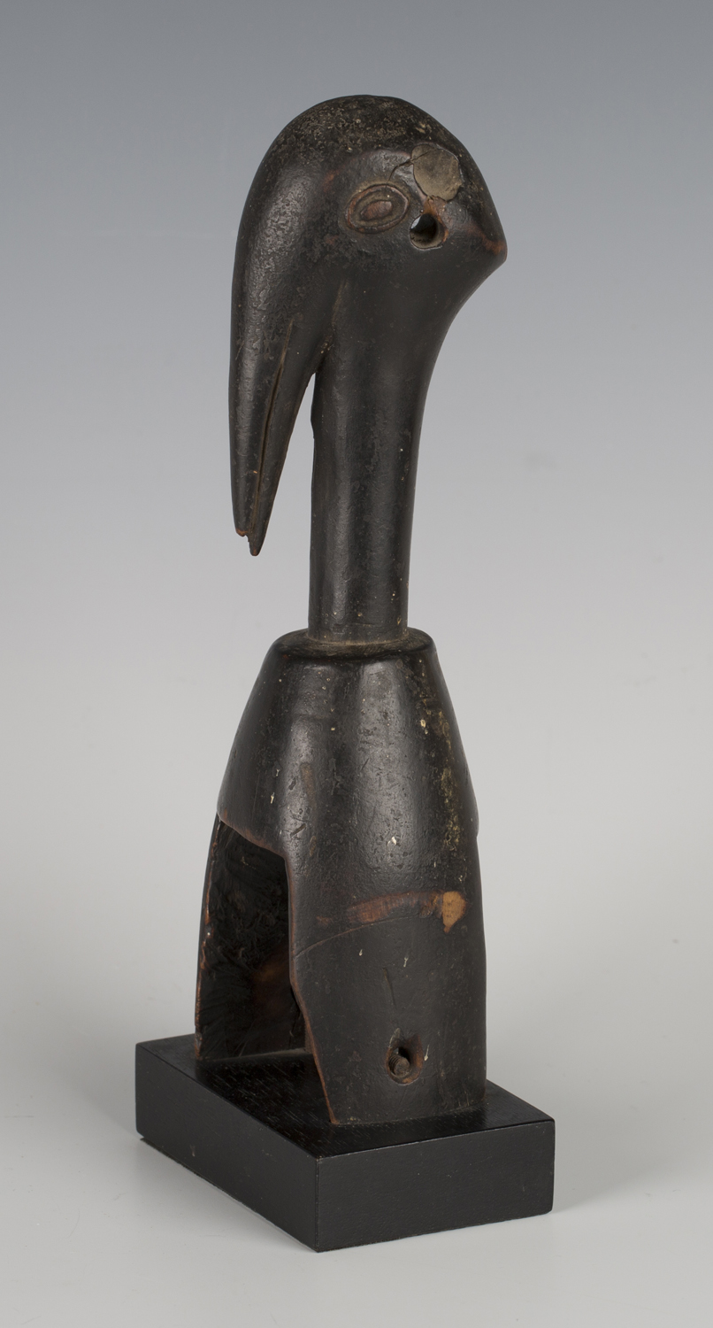 A Senufo carved hardwood heddle pulley, Ivory Coast, modelled as the head of a stylized hornbill - Image 2 of 3