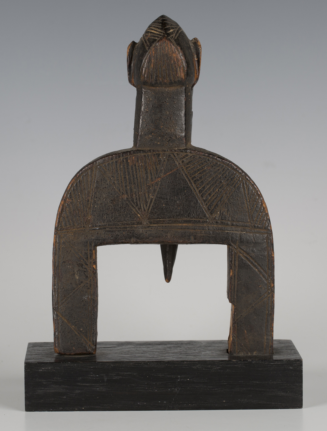 A Senufo carved heddle pulley, Ivory Coast, the finial modelled as the head of a hornbill with - Image 2 of 3