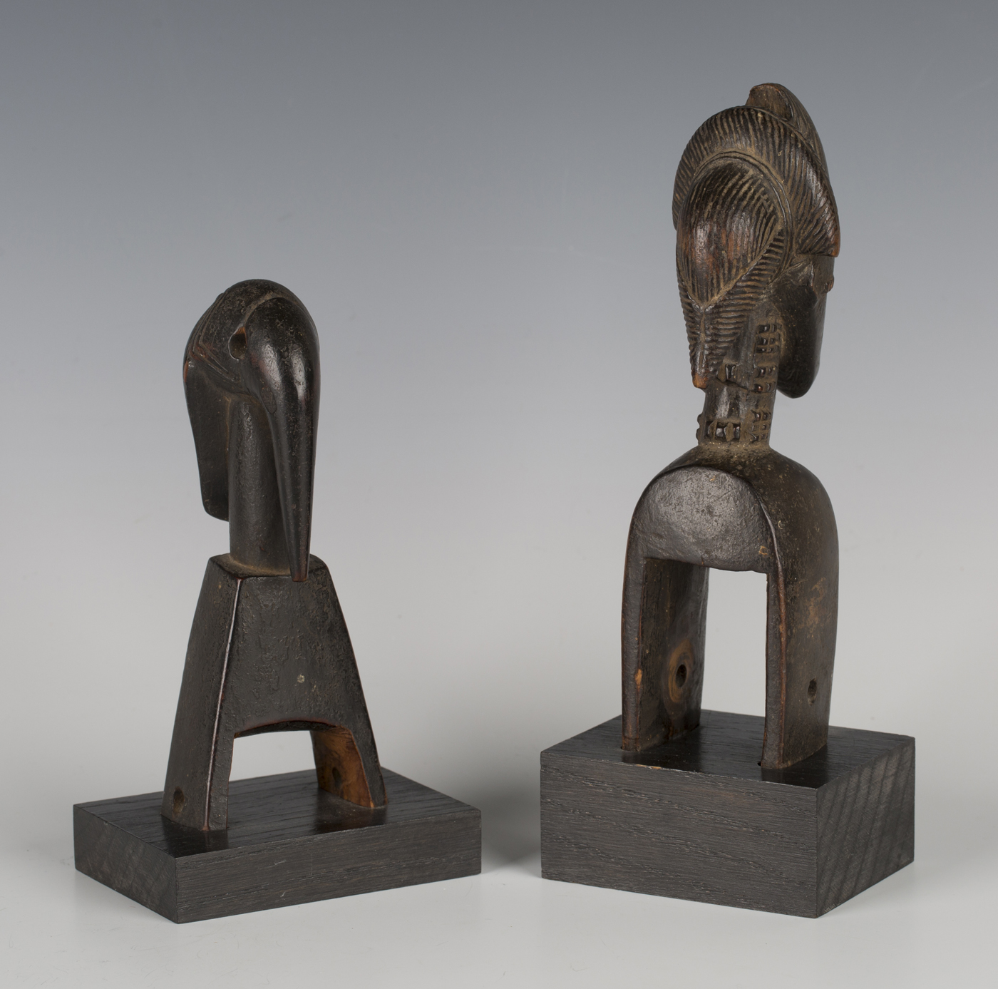 A Baule carved hardwood heddle pulley, Ivory Coast, with incised coiffure and keloid - Image 2 of 2
