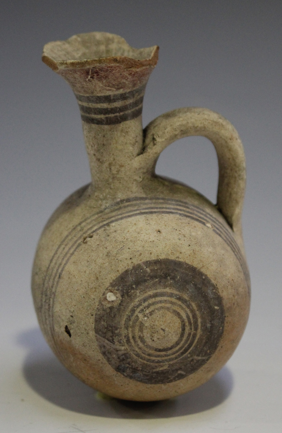 An Ancient Cypriot small terracotta barrel-shaped flask, circa 750-600BC, the flared neck and - Image 2 of 3