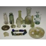 A collection of Roman style and later glassware, including some fragments bearing inscription and