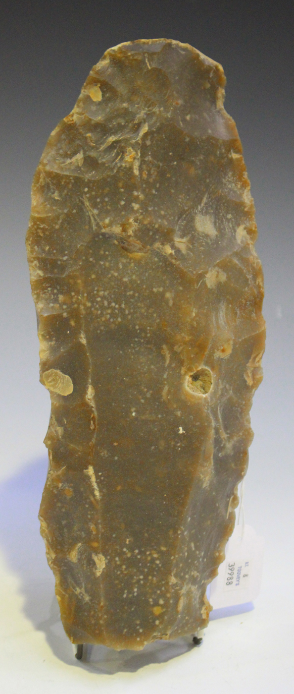 A Stone Age Pressigny flint core, the cortex inscribed in black ink with 'Abilly', length 31cm.