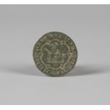 A medieval green patinated chessman-type cleric's seal matrix, 13th/14th century, with pierced