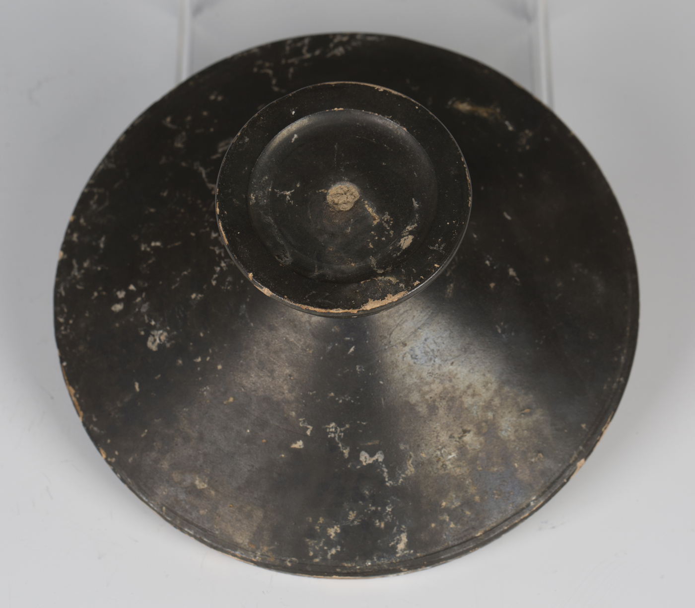 An Ancient Greek black painted terracotta kylix, approx 400BC, the shallow circular bowl raised on a - Image 2 of 3