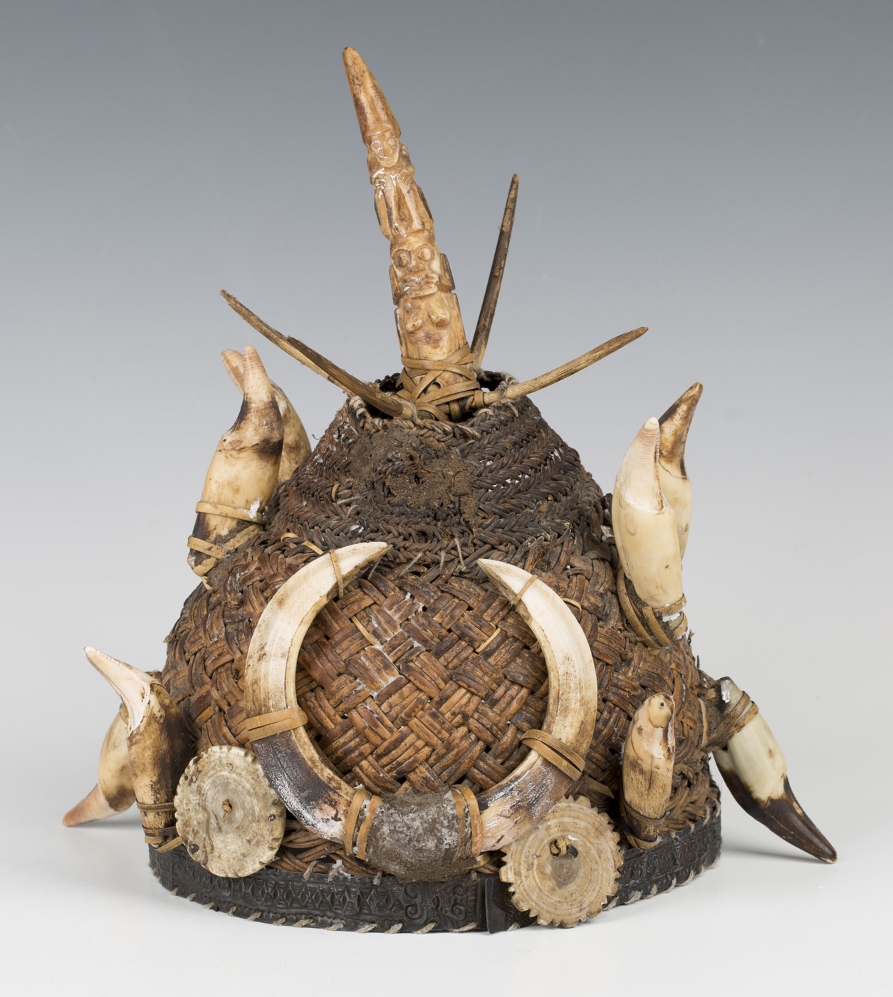 A Nagaland woven cane tribal hat, North-east Indian, with overall applied boars' tusks, height