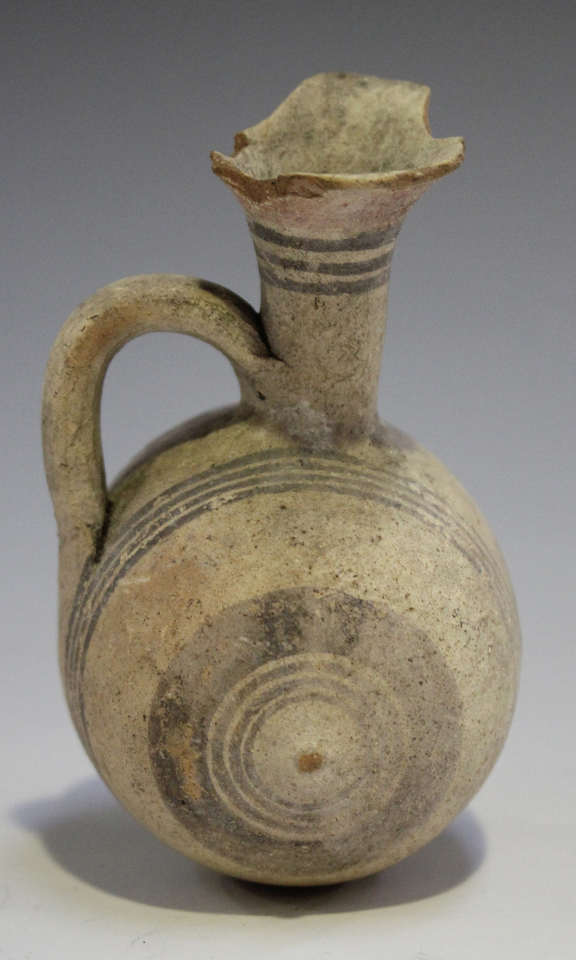 An Ancient Cypriot small terracotta barrel-shaped flask, circa 750-600BC, the flared neck and - Image 3 of 3