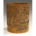 A Chinese bamboo brushpot, 19th century, one side carved with a scene of figures, boats, pavilions