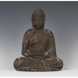 A Chinese carved and painted wood figure of Buddha, Ming style but probably late Qing dynasty,