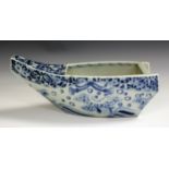 A Japanese Arita blue and white porcelain bowl, Meiji period, modelled as a boat, the sides