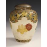 A Japanese Satsuma earthenware tea caddy, Meiji period, the ovoid body thickly enamelled and gilt