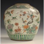 A Chinese famille verte porcelain jar, late Qing dynasty, the ovoid body painted with prunus,