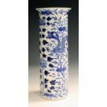 A Chinese blue and white porcelain vase, mark of Kangxi but late 19th century, the cylindrical