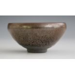 A Chinese 'hare's fur' glazed pottery bowl, Song dynasty style but later, of circular form,