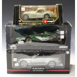 A small collection of die-cast model Jaguar sports and racing cars, comprising three Hotwheels