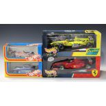 A collection of Mattel Hot Wheels racing cars, including a Jordan Formula 1 Damon Hill, a Ferrari