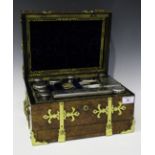 A Victorian brass bound burr walnut vanity case, of coffre-forte form, the compartmentalized