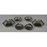 A pair of Edwardian silver hexagonal bonbon dishes, each with pierced sides within ribbon and reeded