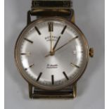 A Rotary gold circular cased gentleman's wristwatch, the signed silvered dial with baton shaped