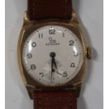 A Record 9ct gold cushion shape cased gentleman's wristwatch, with a signed jewelled movement, the