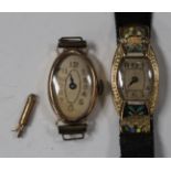 An 18ct gold cased and enamelled lady's wristwatch, with an unsigned movement, the dial with