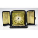 An Art Deco Zenith Watch Co gilt metal cased bedside alarm clock, the dial with Arabic hour